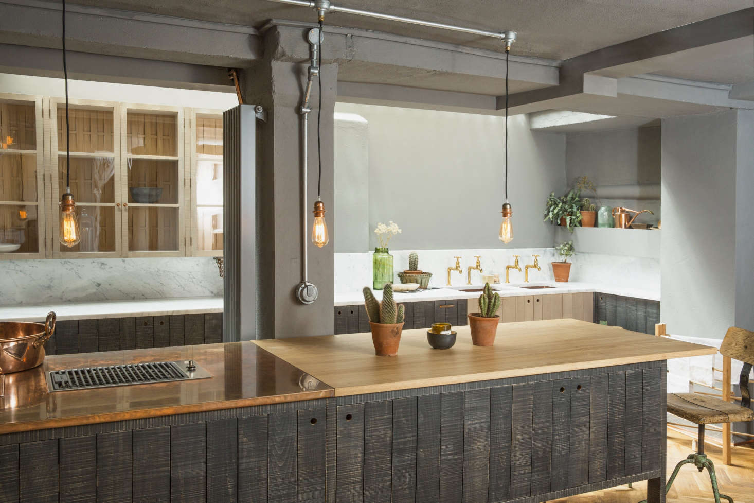 The design is an ode to natural materials: copper, marble, and particularly wood: Cox uses sustainable hardwoods grown in England (and is ever on the alert for fallen trees 
