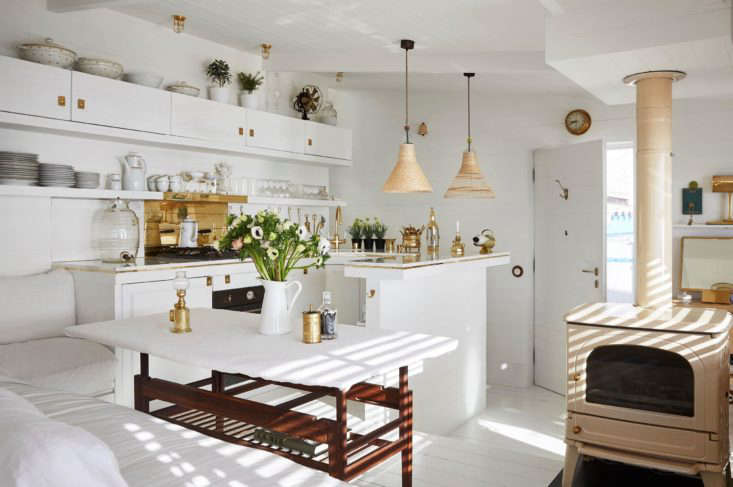 the open plan main floor features a glamorous kitchen with carrara marble, 19