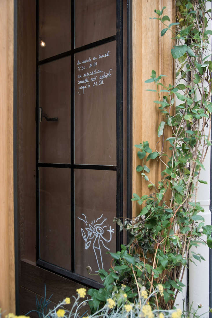 steel frame windows double as handwritten signs—and a place for quirky,  30