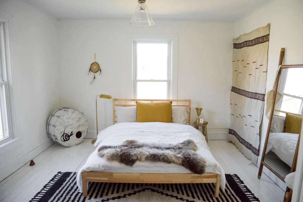 A bright bedroom with high/low finds.