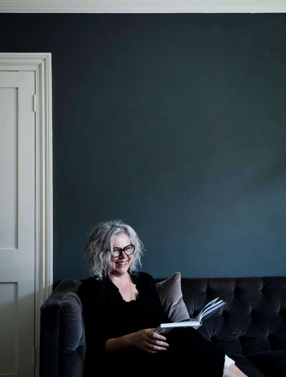Kate in her dramatically toned sitting room.