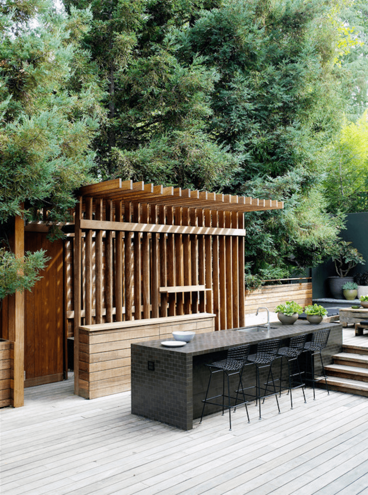 la design collective commune created this pergola like outdoor kitchen in a rem 18