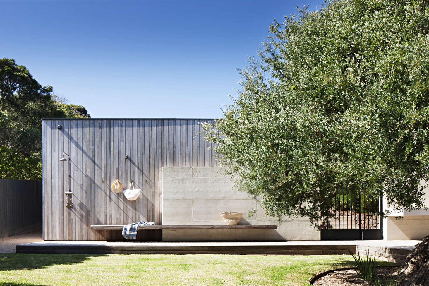 The beach is nearby—hence this luxurious outdoor shower.