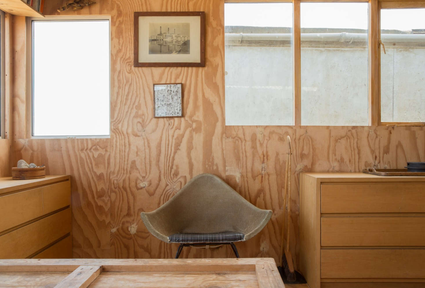 Furnishings include a midcentury chair of unknown origin purchased by Durrell