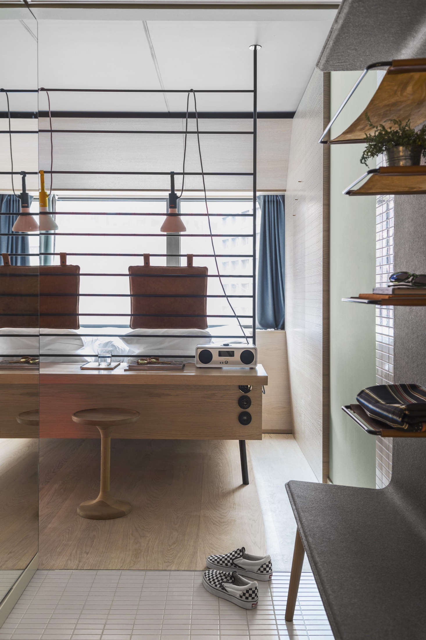 The desk-fronted beds are custom Studio Aisslinger designs. So is the hotel lighting; it