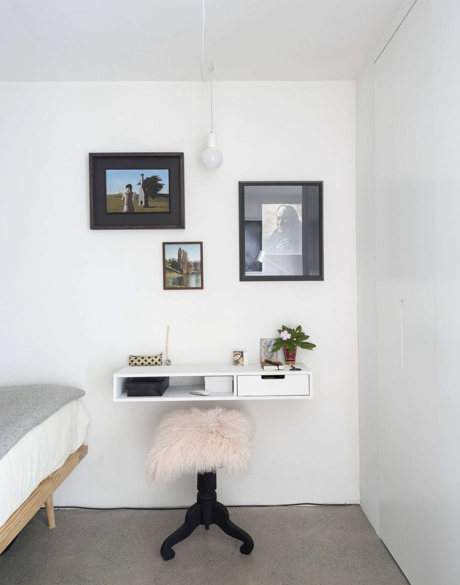 The requisite office space is behind the shelving divider in the 