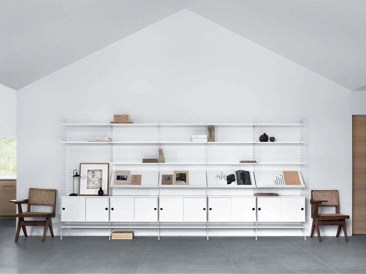 the classical string shelf modular system was designed in \1946 by swedish arch 17