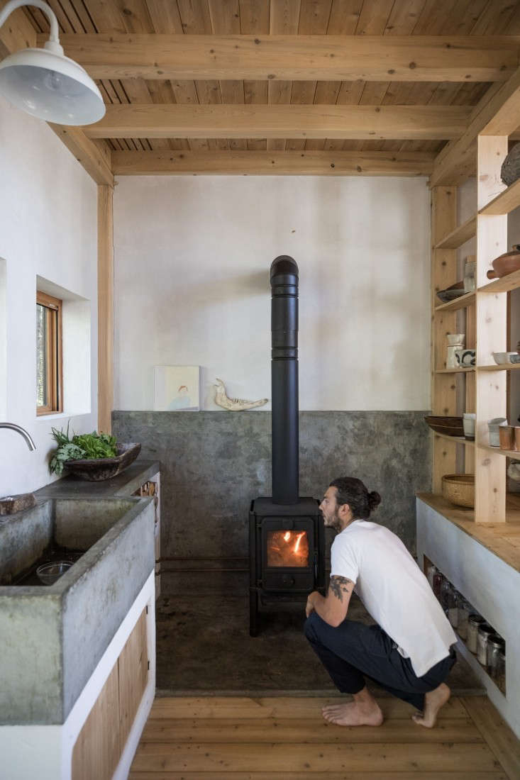 a poured in place concrete sink in the larder like kitchen of a diy home in mai 18