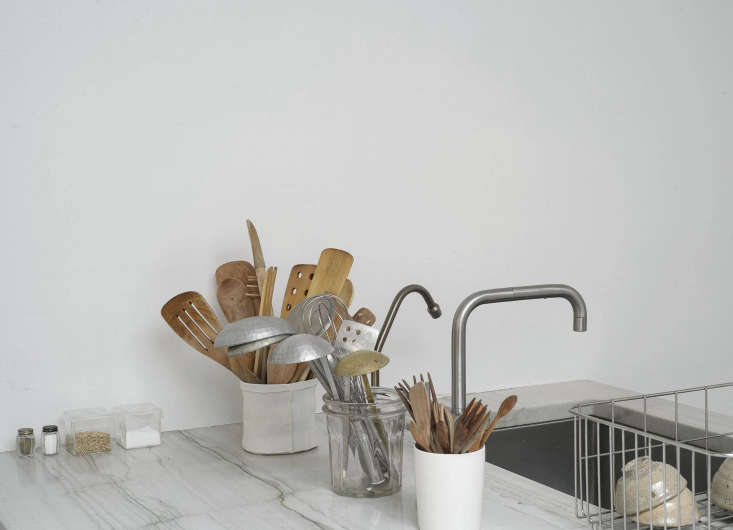 shop owner makié yahagi hand washes most of her dishes in the single bowl  19