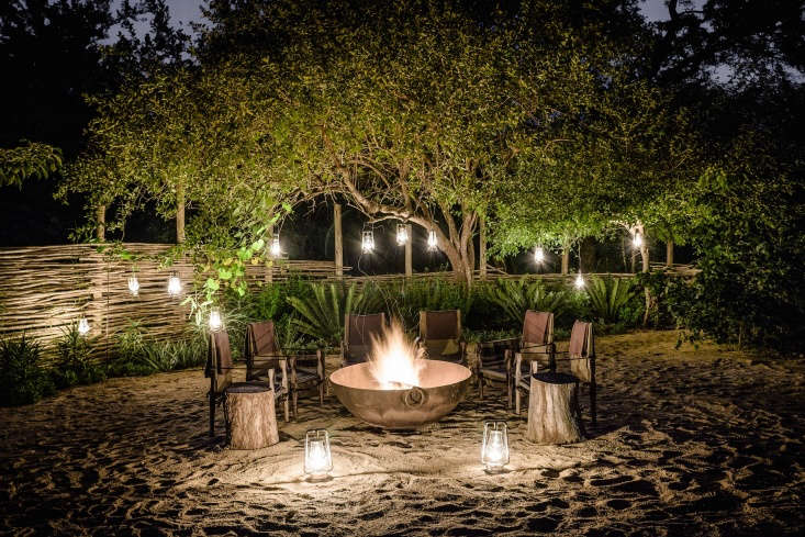 guests are encouraged to congregate around the fire pit for a cocktail before t 22