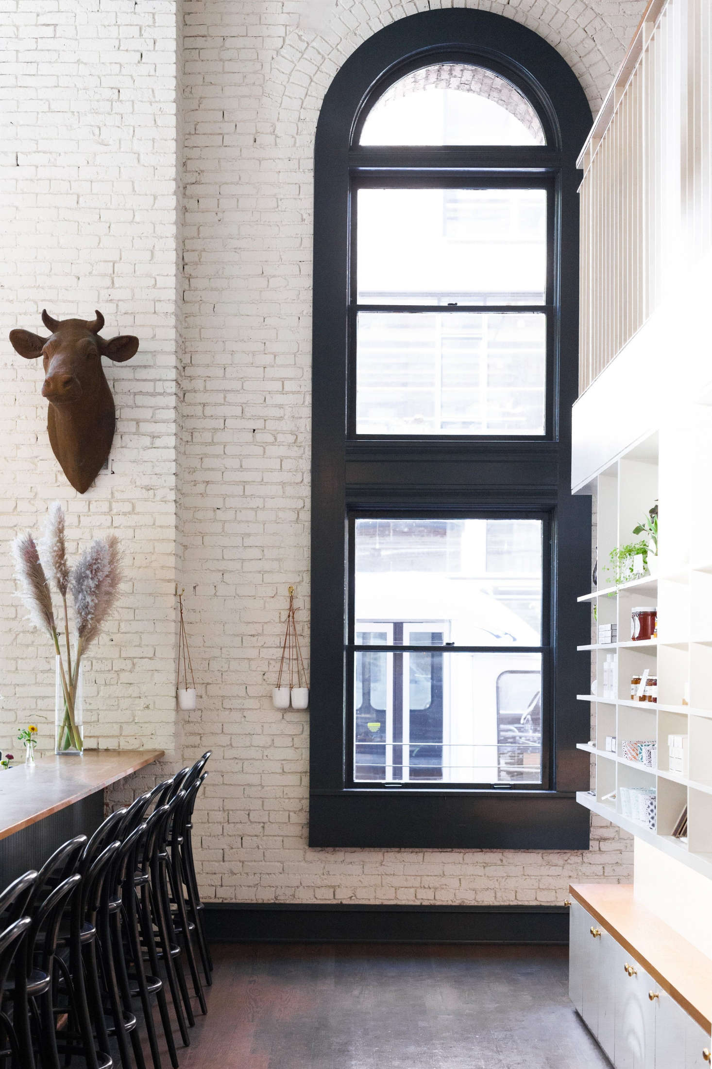 A hallway on the other side of the bar leads to the stair to the upstairs dining balcony. The bull
