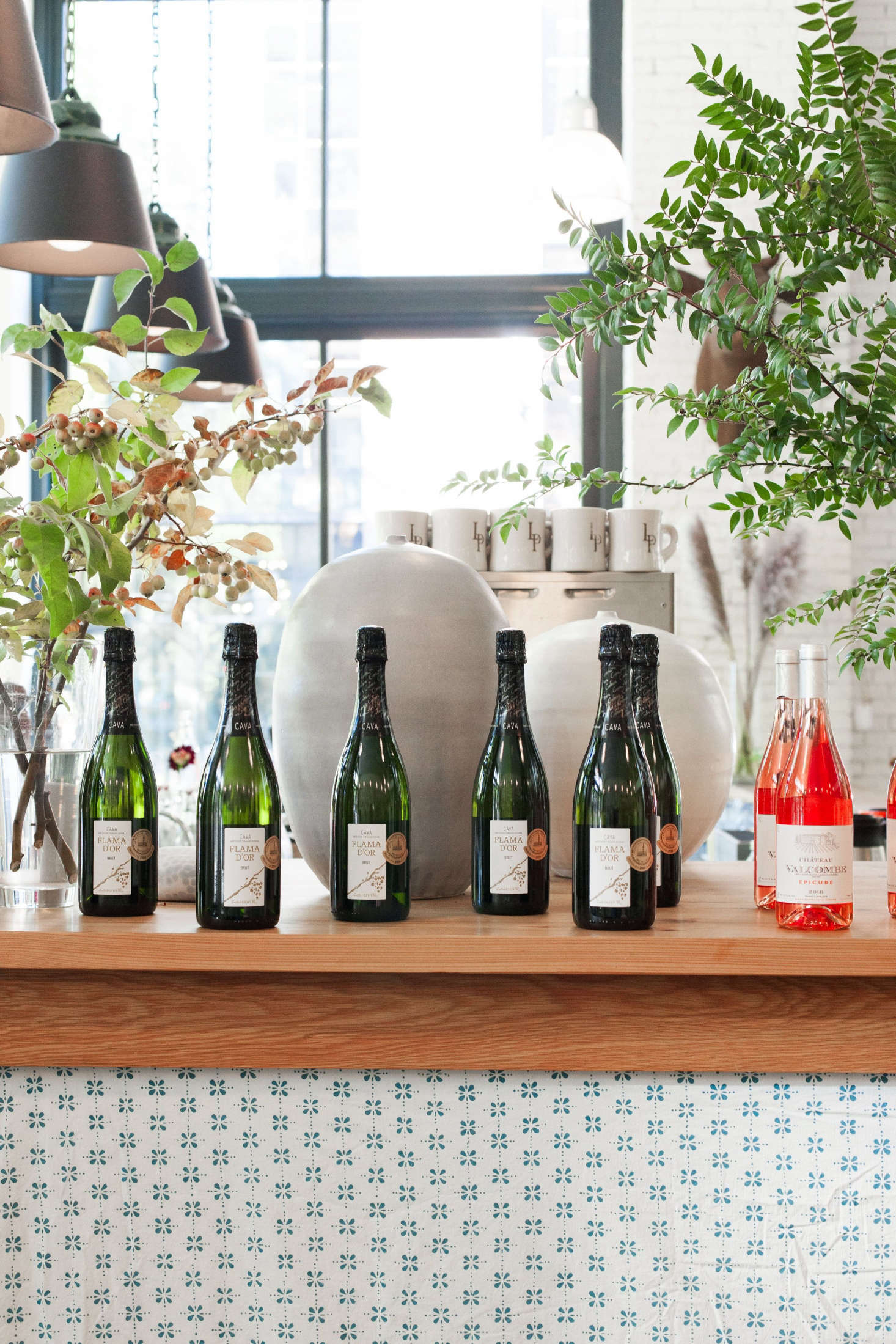Perched near the entrance, bottles of cava and rosé give guests subtle pairing suggestions.