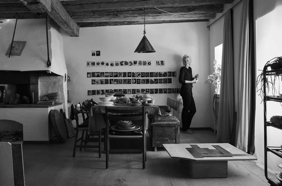 The dining table, with eclectic seating. Photograph by Ditte Isager.