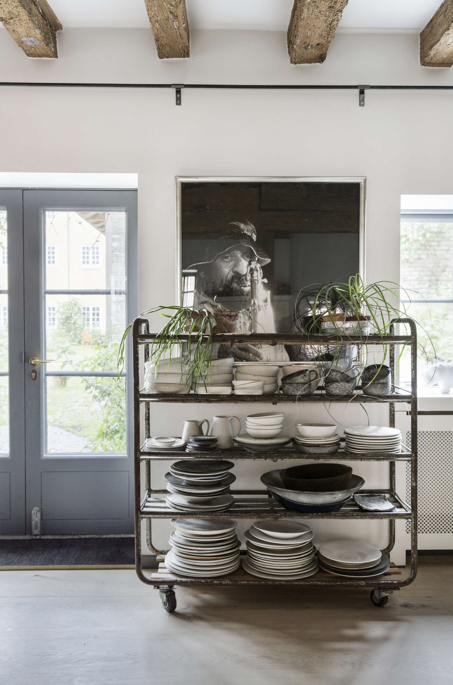 The elevated cart: Shelves on wheels keep everyday ceramics at the ready. Photograph courtesy of Dinesen.