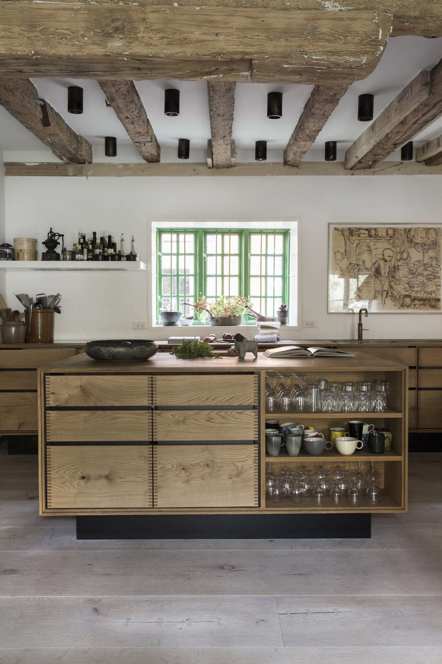 The versatile shelving, styled with glassware. Photograph courtesy of Dinesen.