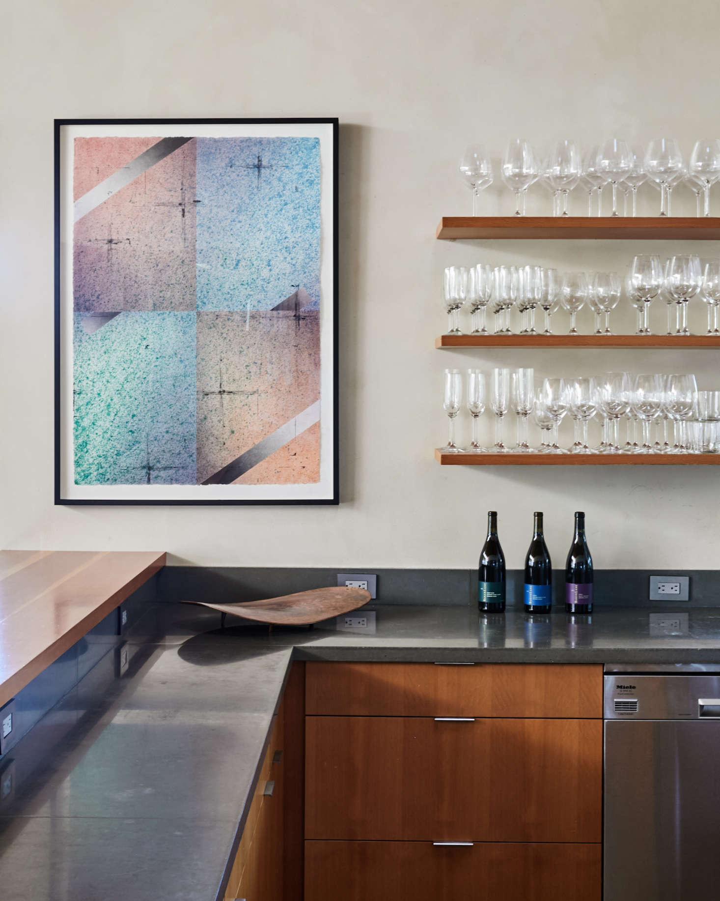 In addition to being a winemaker, Singer is a working artist (see his online portfolio here); the painting at the end of the kitchen is his.