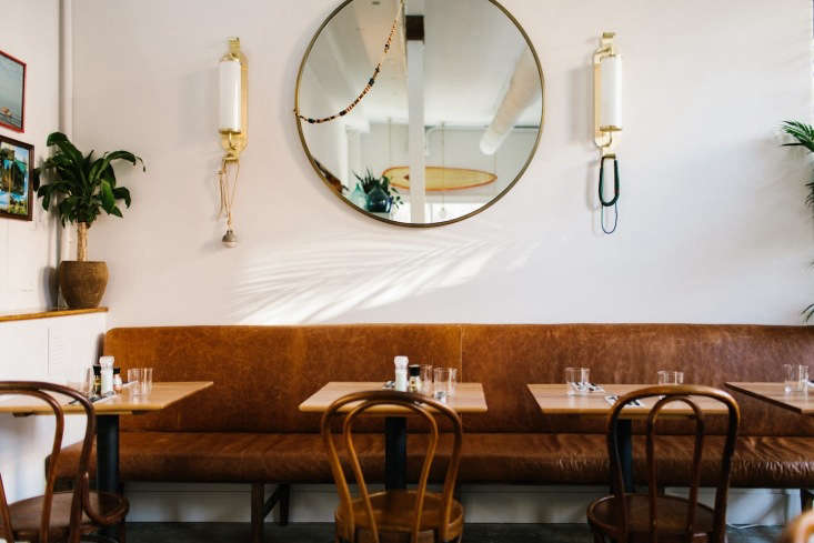 aged leather banquette seating, custom made by a local car upholsterer, complem 19