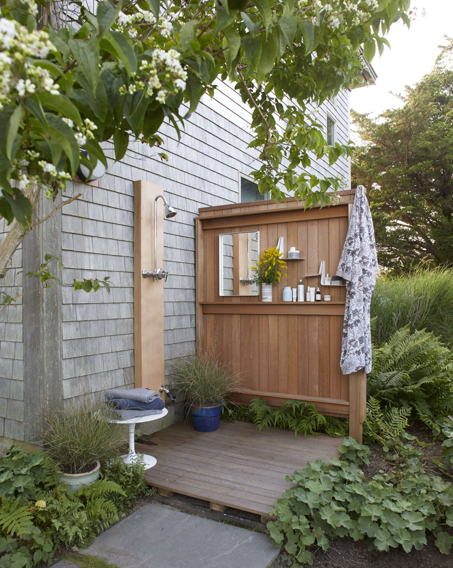 The outdoor shower is just outside the master bath, but it