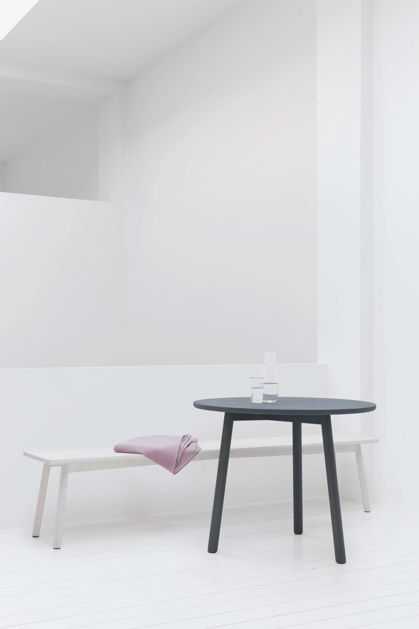 The smallest Profile Table in dark green is paired here with the Profile Bench, which is made in three sizes starting at €8. The table and stool legs are detailed with wool-felt stoppers.