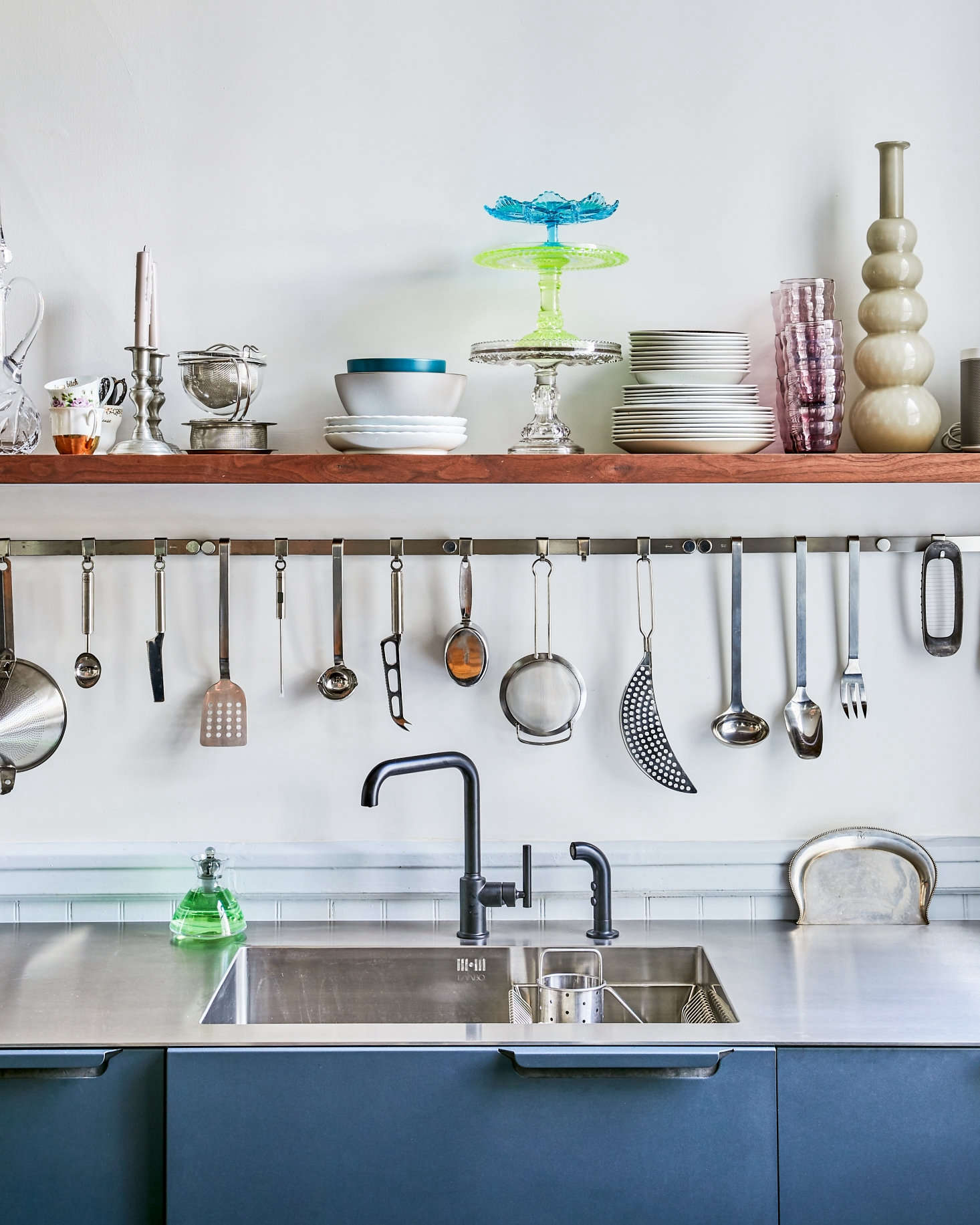 Amy had the stainless steel countertop with integrated sink shipped from Copenhagen (