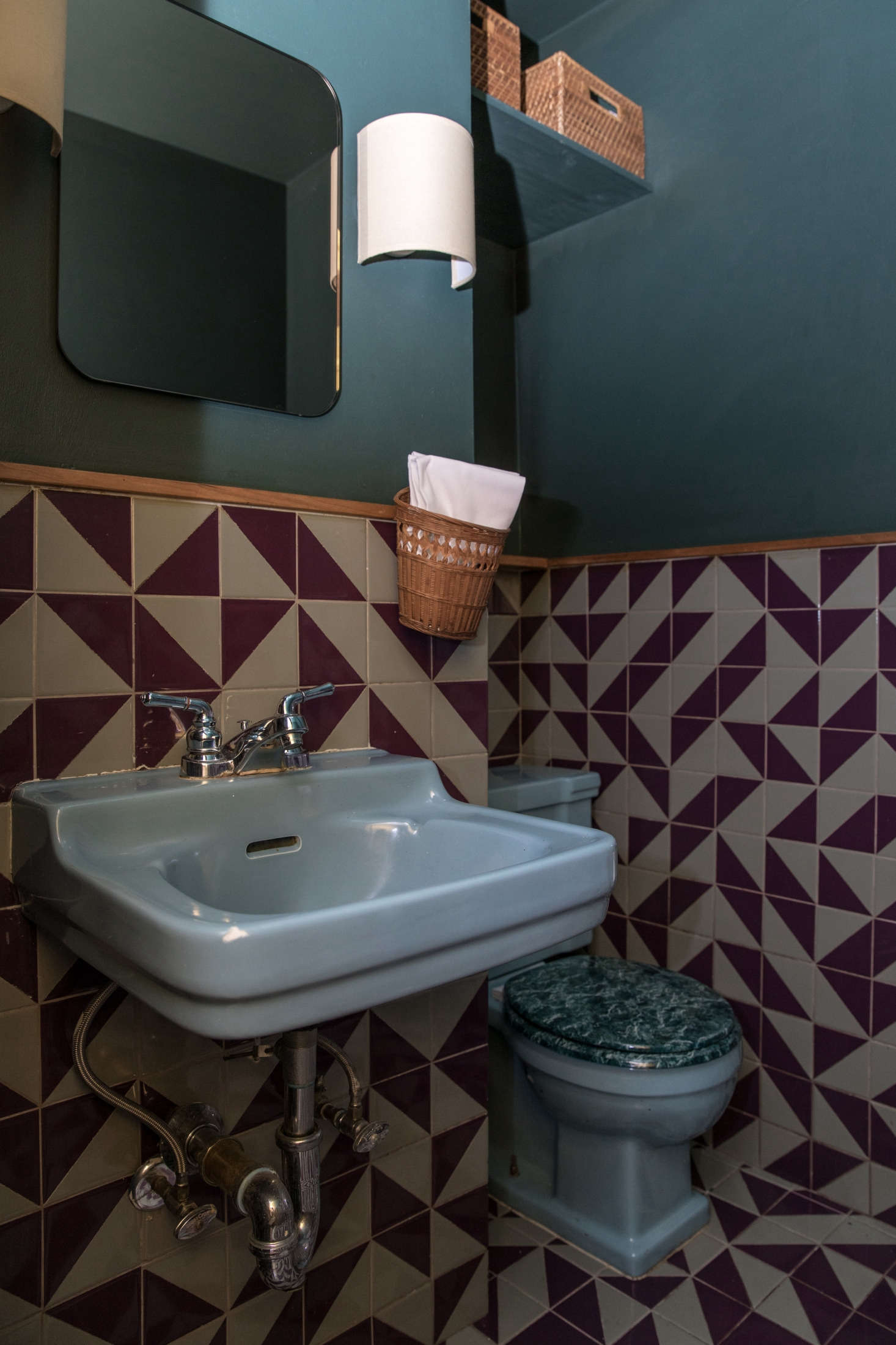 The small bathroom is not what you might expect from the rest of the space. 