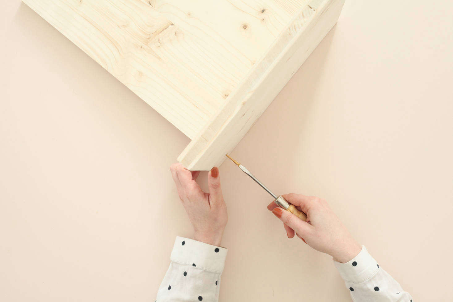 The wood is three-ply plywood that