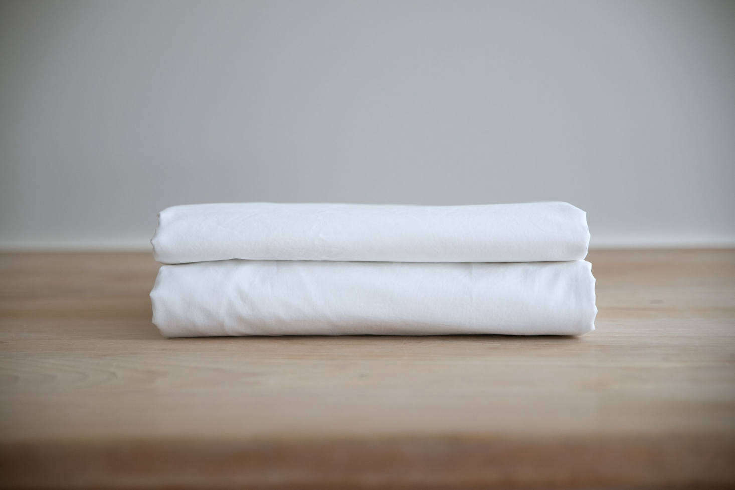 The finished product: properly folded fitted sheets are no longer an eyesore in the linen closet.