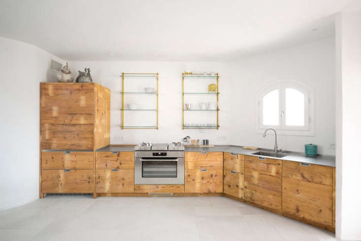 the finished kitchen, with cabinet fronts made out of \250 year old larch wood  17