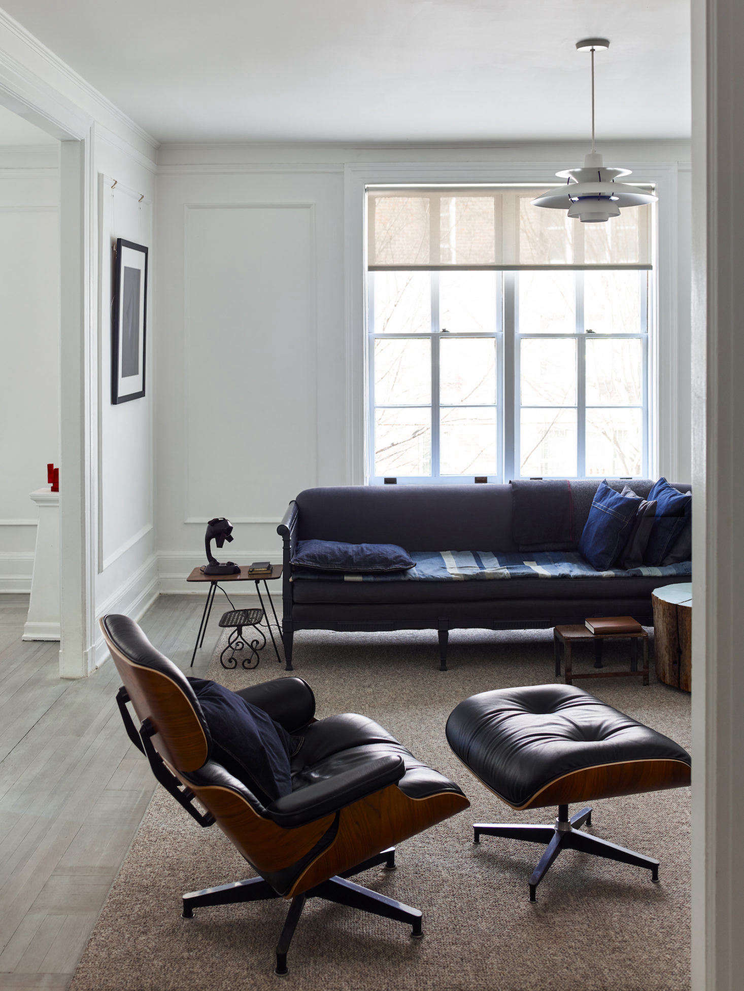 The quilt on the sofa was made by Martha Stewart Living style editors for a denim crafting story years ago (you can read about it here); Axe later scooped it up at the magazine
