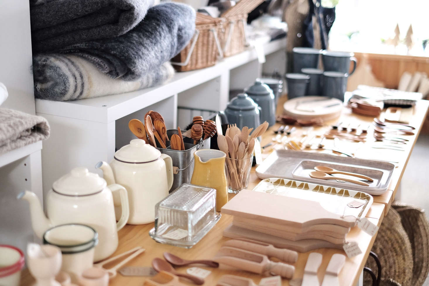 A range of wood items includes Honey Dippers (£5) and Mango Wood Boards (£