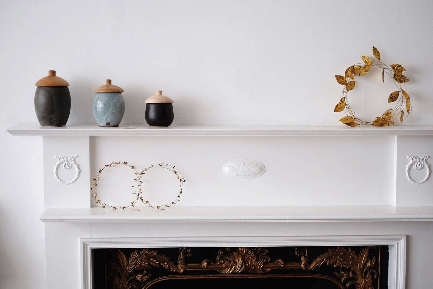 On the mantel: metal Leaf Garland (currently sold out online) and Small Leaf Garland (£).