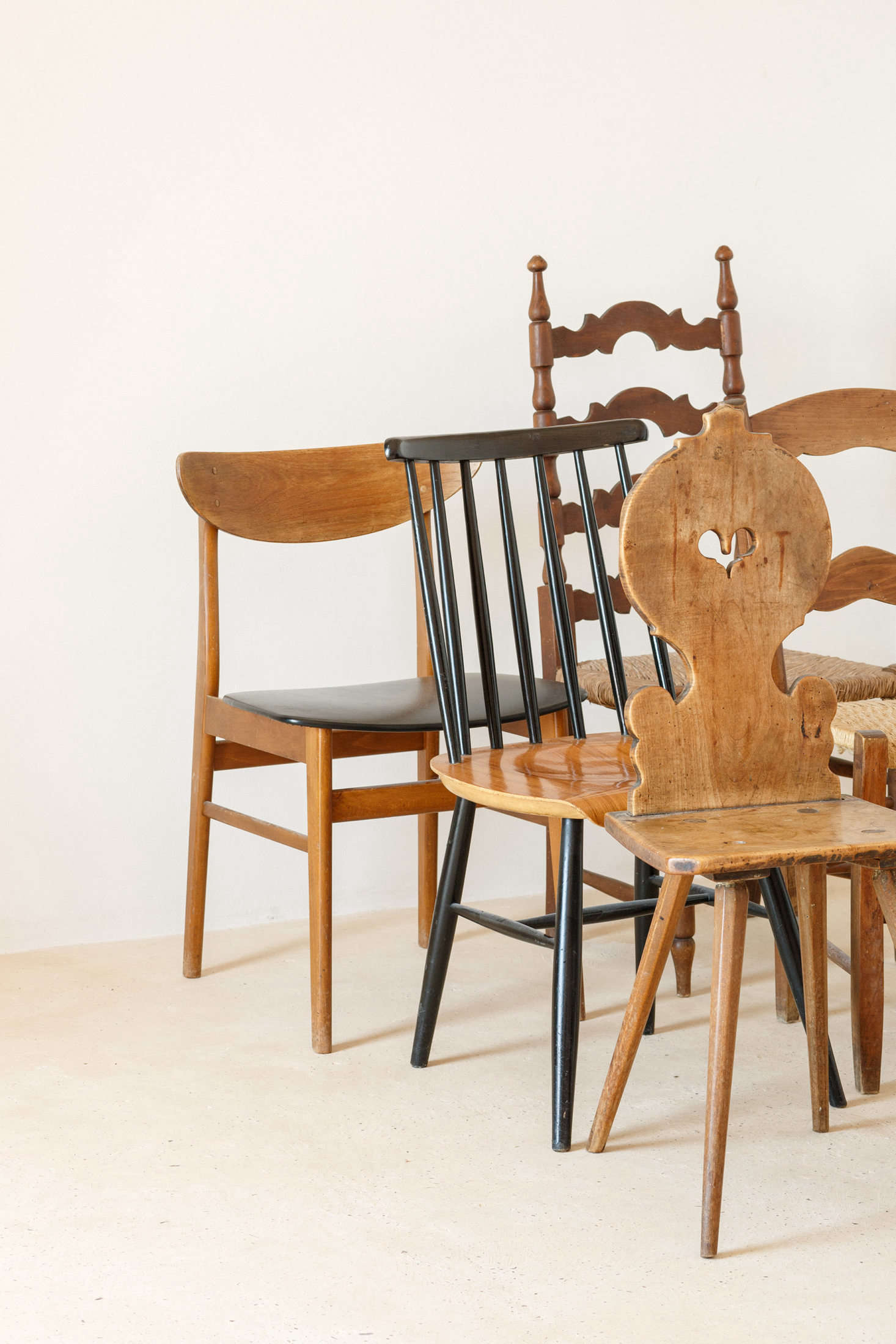 The chairs throughout the house are a mix of styles: 