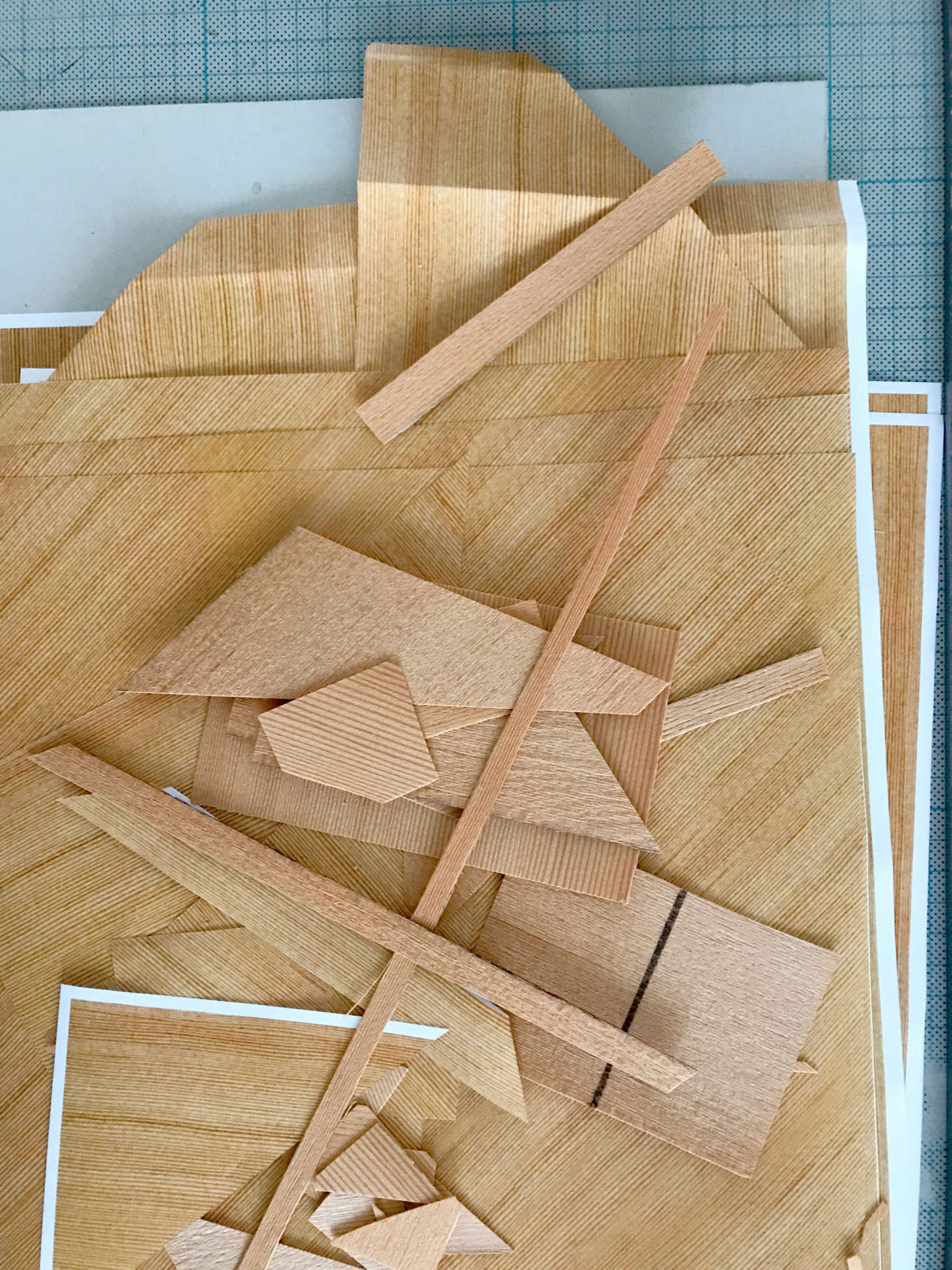 Manz played with wood veneer pieces to work out the design: 
