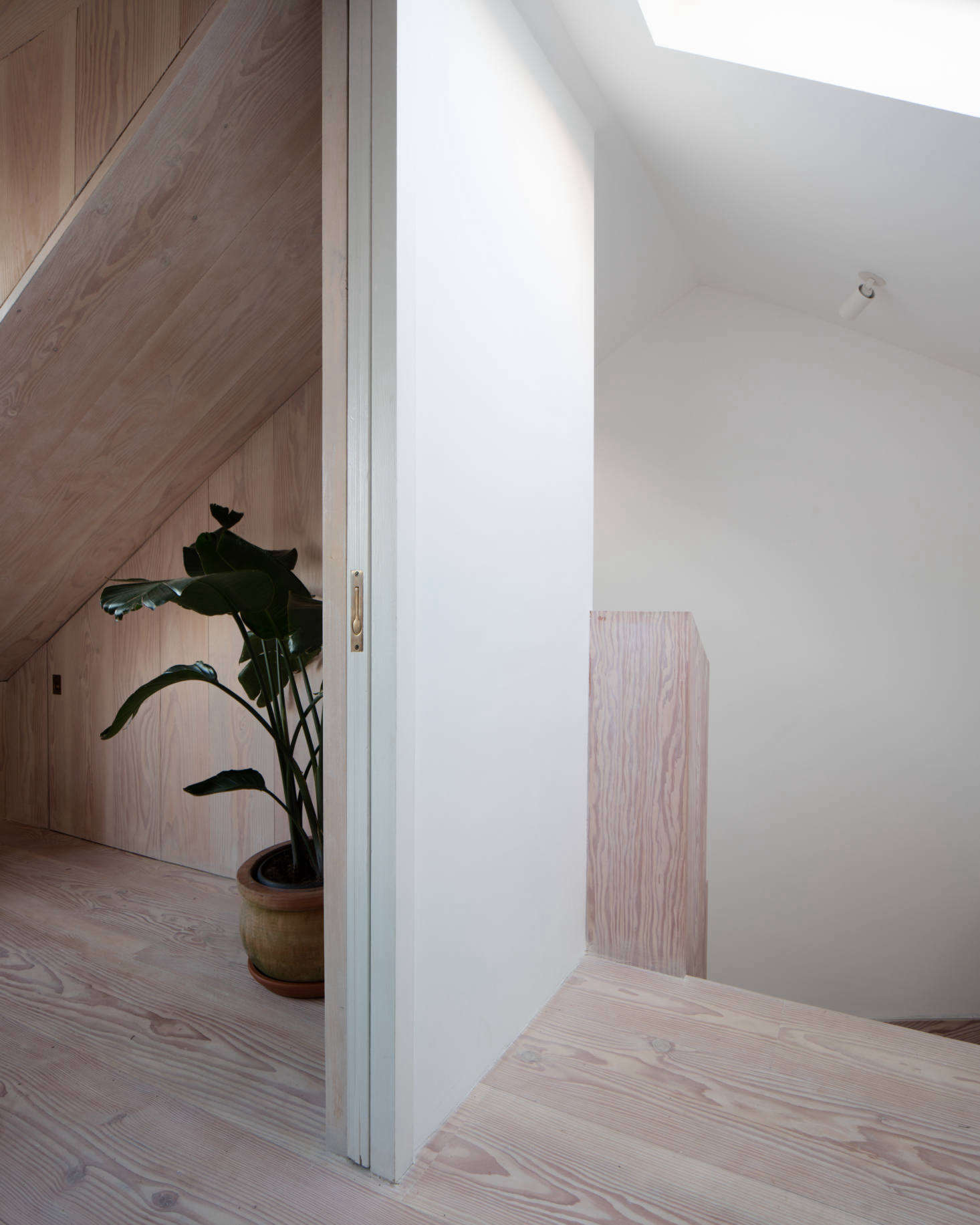 Upstairs, more Dinesen, including the stair surround.