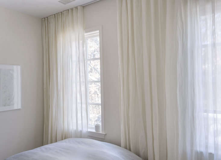 kinnasand curtains are hung on a track in both upstairs bedrooms to create an o 22