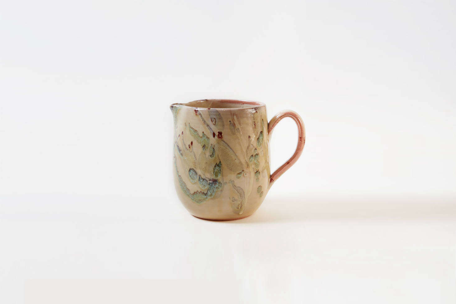 For a ceramic jug similar to the one on the countertop, the Bellocchi Water Jug ($5) in yellow speckle is made in Marche, near the Umbrian border in Italy, for Il Buco Vita. The jug is currently out of stock (contact Il Buco Vita for restock information), but the Wine Pitcher from the same collection is available, also $5.