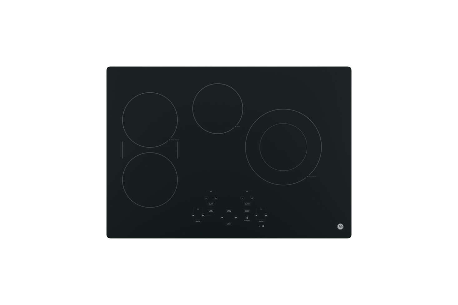 Most of the kitchen appliances are integrated behind cabinet panels. The GE 30-Inch Profile Smooth Surface Electric Cooktop is similar to the cooktop Caroline and Steffan chose. It