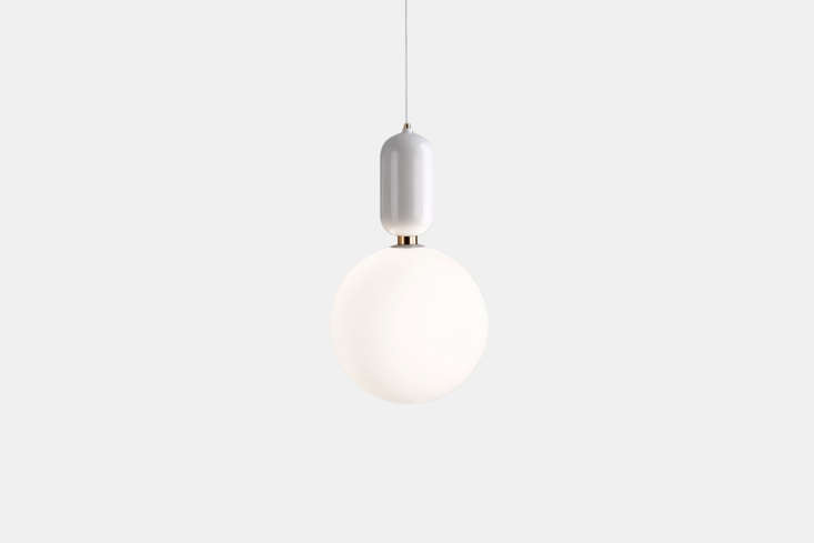 the pendant light is the small white aballs pendant lamp by jaime hayon and par 27