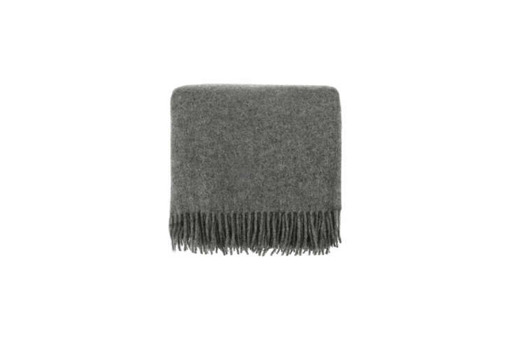 the throw blanket is the miramar wool blanket in dark gray lamb\2\17;s w 32