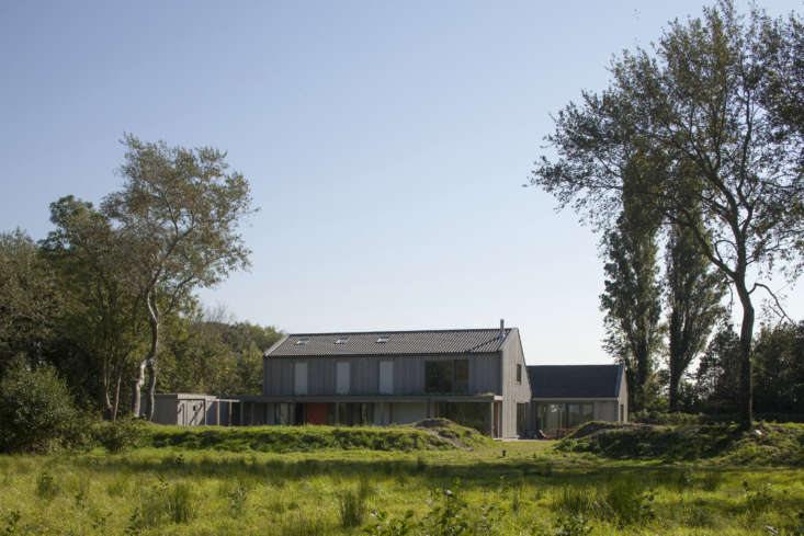 the larger barnlike building as seen from behind the house. the property sits o 17