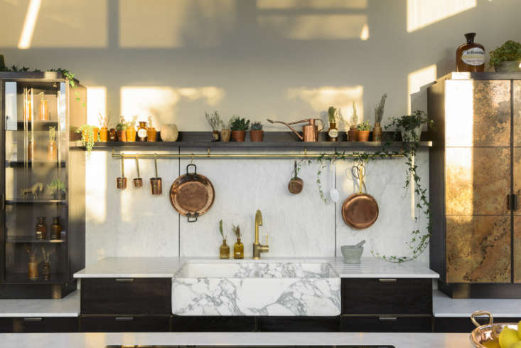 the sink is arabescato marble and the counters and backsplash are carrara marbl 19