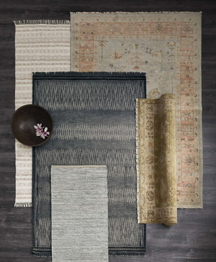 a selection of eileen fisher rugs. the dark gray ikat hand knotted rug (\$ 24