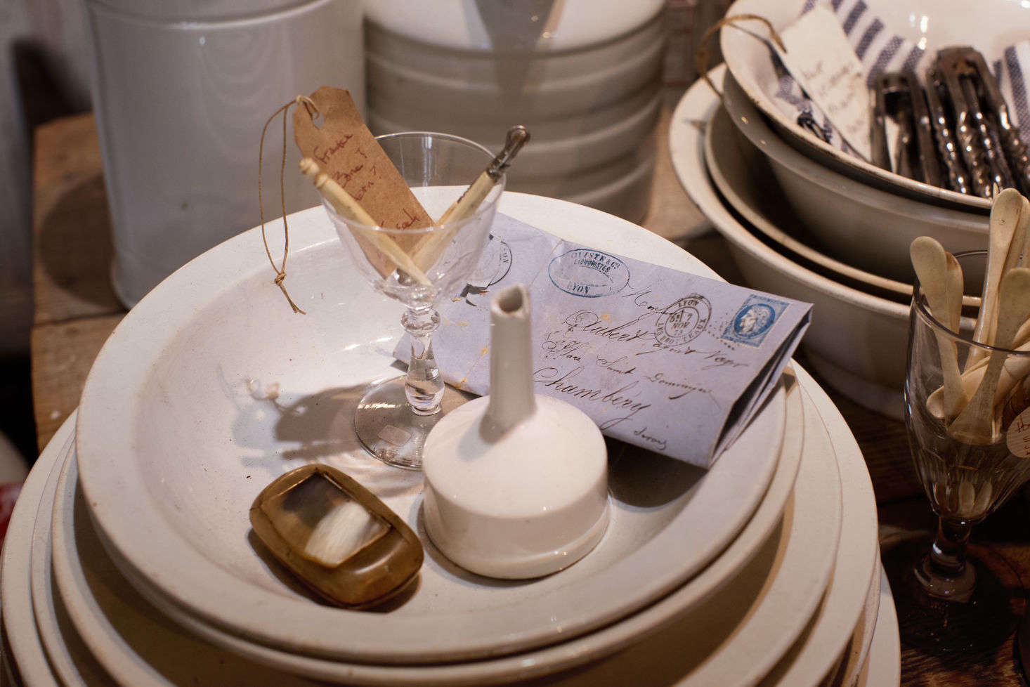During their winters in France, Sharon and Paul scour flea markets for their fabulous finds, including textiles, silverware, baskets, ephemera, and tons of ironstone.