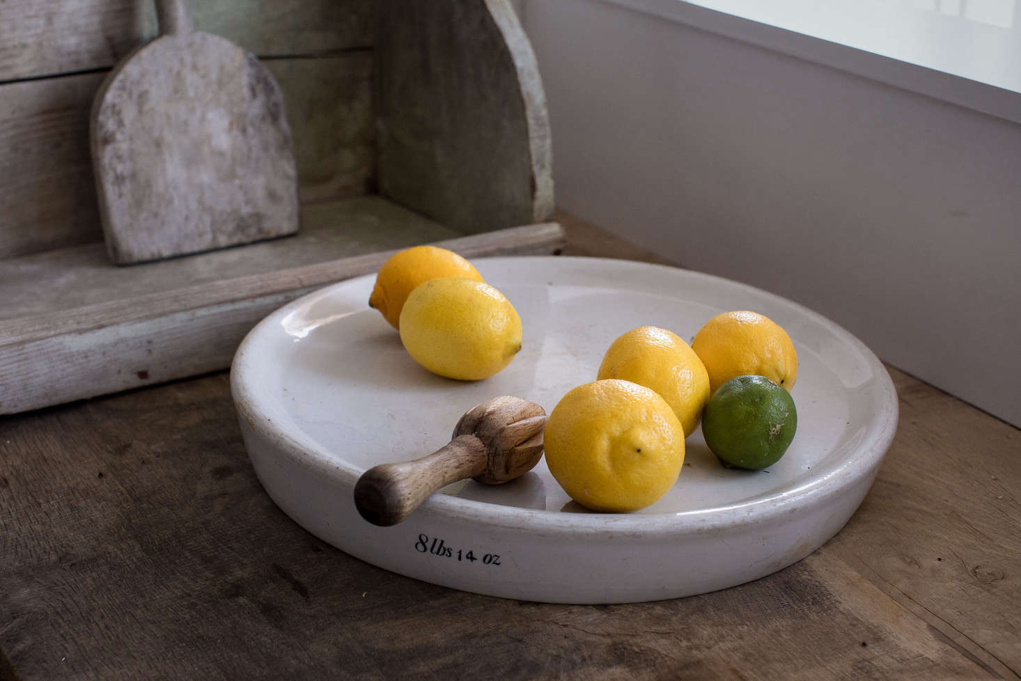 The couple repurposed an old English scale weight as a tray.