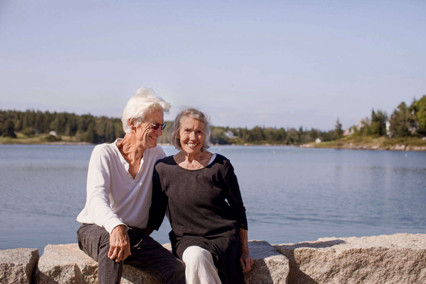 Paul and Sharon enjoy the sun in the small yard outside their bedroom windows, the future site of the couple