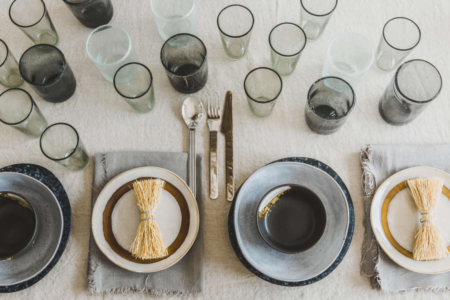The table is covered with a Washed Linen Tablecloth, $59.99, from H&M Home. A 
