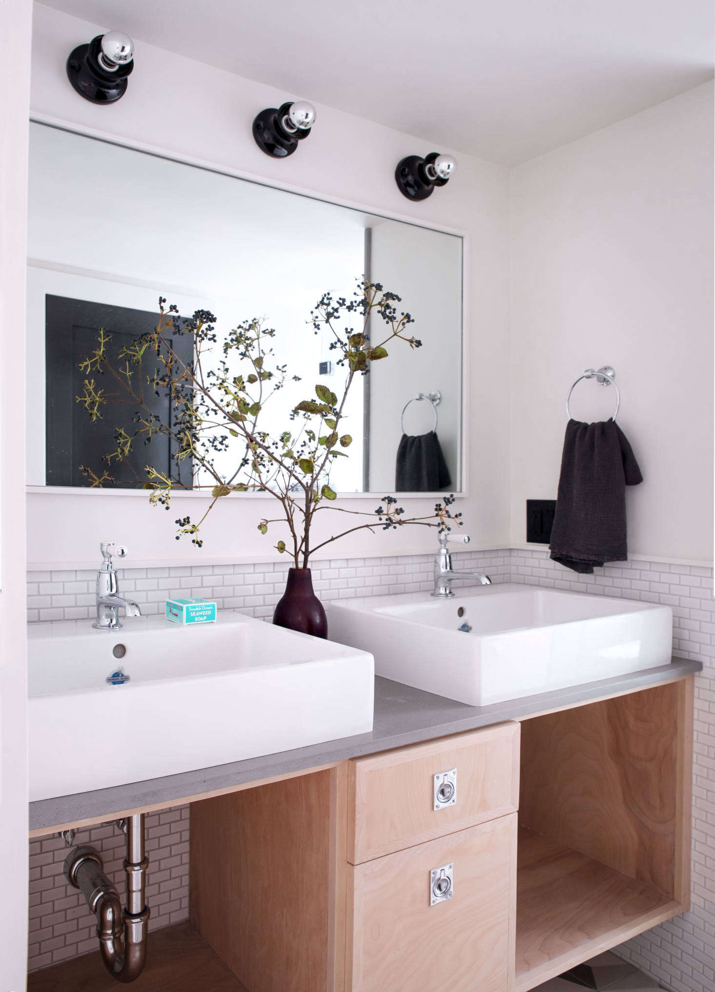 The downstairs bath features Waterworks