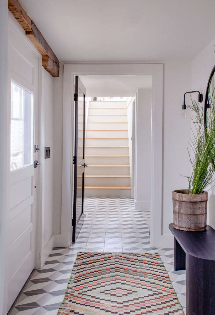 entryways are sometimes guilty of becoming drop zones for coats, bags, and the  18