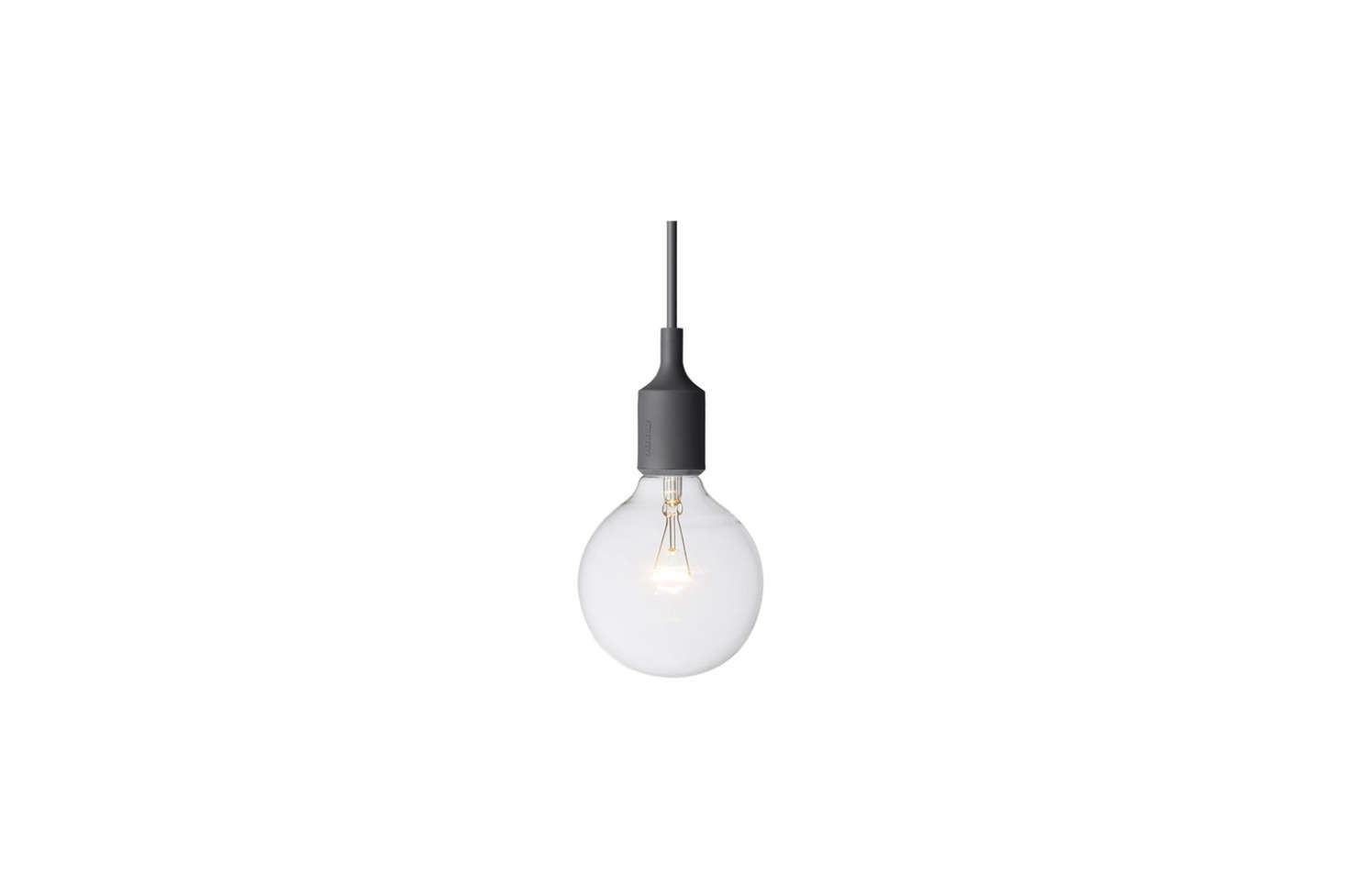 Anstruther hung a trio of Muuto E Ceiling Light Fixtures in black ($79 each from YLighting) over her kitchen island.