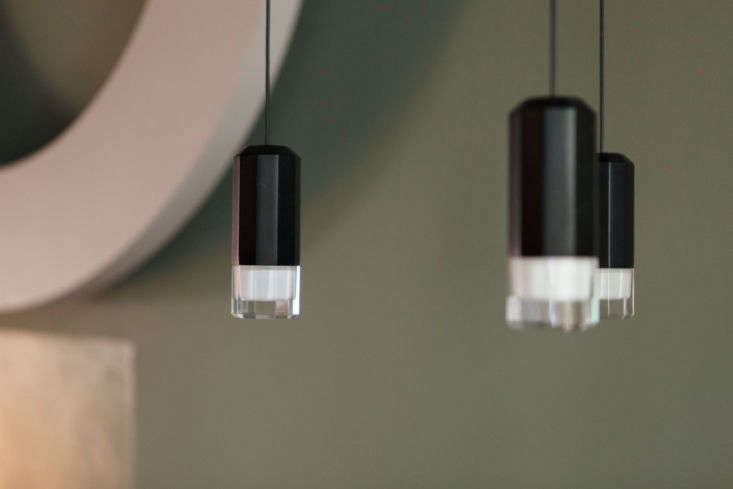 a detail of the light that hangs over the small kitchen table, the wireflow led 21